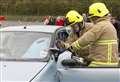 Woman rescued from wreckage of car after crash