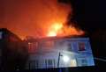 Ten fire engines battle house blaze