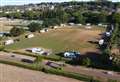 Travellers pitch up with 17 caravans on playing fields