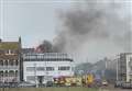 Firefighters battle blaze at block of flats