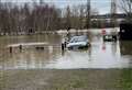 Woman rescued from flooding as several roads shut