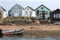 Two arrested over beach hut attacks