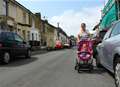 Mother is forced to dodge cars in road with children 