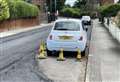 Driver left ‘red faced’ after car gets trapped by cones during resurfacing