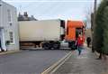 High street blocked by stuck lorry