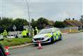 Man in hospital after crash at busy roundabout