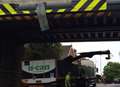 Delays after lorry hits bridge