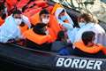 Migrants brought ashore by Border Force after crossing Channel on dinghy