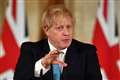 Boris Johnson returns to Downing Street to steer coronavirus response