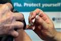 Free flu vaccine extended to over-50s as NHS battles ‘twin threats’ with Covid-19