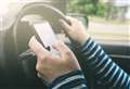 Picking up your phone while driving could cost you £200 from today 