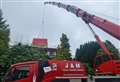 New rooftop apartments craned into place