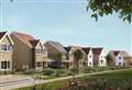 First homes hit market at controversial village site