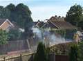 Firefighters tackle unexplained fence and hedge fire