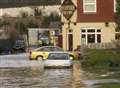 Pub flooded as river bursts its banks