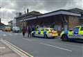 Officers descend on train station