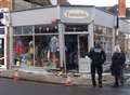 Car smashes into shop front