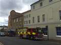 Young boy reported climbing up shopping centre building