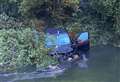 Range Rover plunges into river