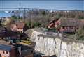 Crumbling cliff above housing estate saved by £2m project