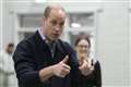 William expresses concern at mobile phone use as he visits youth club