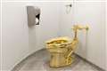 Three men deny charges over theft of gold toilet from Blenheim Palace