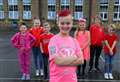 Schoolboy thinks pink for good causes 