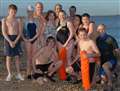 Swim club members brave sea to raise funds