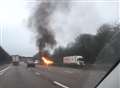 Car bursts into flames in motorway crash