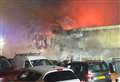 Police investigating huge car garage fire