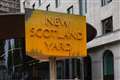 24 protesters arrested after New Scotland Yard sign covered with yellow paint