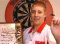 Young gun grabs world darts title