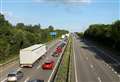 Lorry ploughs through motorway crash barrier