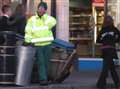 Street cleaner picks up litter fine