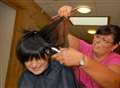 Hadley loses long hair for Trigwell fund