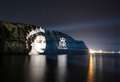 Stunning tribute to the Queen lights up cliffs