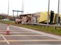 Traffic chaos after truck turns over