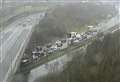 Flooding, crash and overturned car cause motorway delays