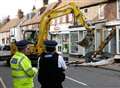 Digger remove cash machine