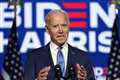 Joe Biden says ‘we’re going to win this race’ but does not declare victory