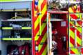 Man arrested on suspicion of murder after fire at flats in east London