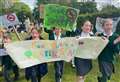 School children protest over car park extension near green space