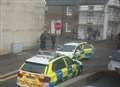 Armed police arrest three men