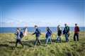 Cop26 climate activists on 1,200-mile walk cross border into Scotland