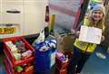 Girl, 8, donates nine crates of supplies to foodbank after making her own leaflet