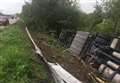 Lorry crashes into embankment