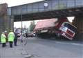 Disruption as truck is stuck under rail bridge