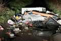 Country lane blocked after rubbish and tyre dumped