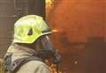 Crews battle bin fire