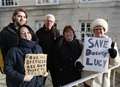 Protesters gather outside County Hall